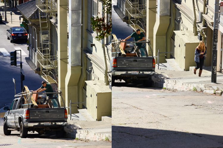 John MacLean Two and TwoDiptych from John MacLean’s Two and Two series, photographed in San Francisco. The left image shows a young workman standing in the back of a pickup truck with five bullet holes in the tailgate, city architecture compressed behind. In the right image, he turns toward a young woman walking uphill while checking her smartphone. The work reflects on the male gaze in an urban context.