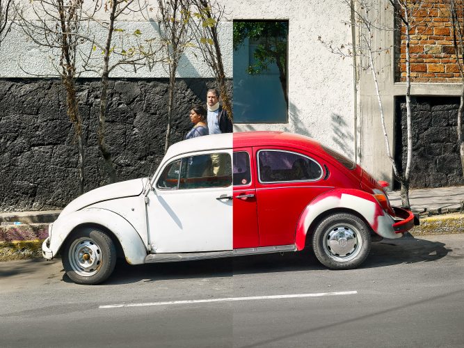John MacLean HometownsTwo aging VW Beetles—one red, the other white—are parked along a road in San Ángel, Mexico City, Gabriel Orozco’s hometown. Both cars have been digitally joined in Photoshop, cut and joined together to mimic Gabriel Orozco’s iconic conceptual artwork La DS, serving as an artistic homage. A man wearing a white neck brace watches the photographer. The walls are black lava stone.
